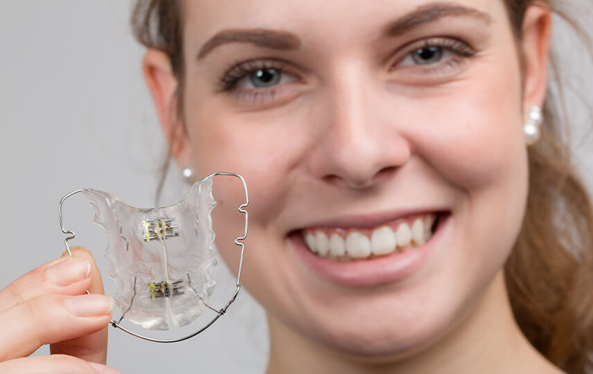 Will my teeth move back if I don’t wear my retainer?